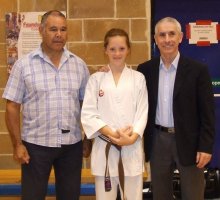  Beth pictured with Sensei Billy Higgins and Sensei Andy Sherry after passing her Ni Dan Grading (2nd Dan Black Belt)